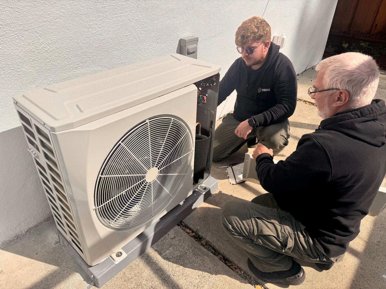 ABC Service technicians replacing an outdoor AC condenser at a Bay Area home.
